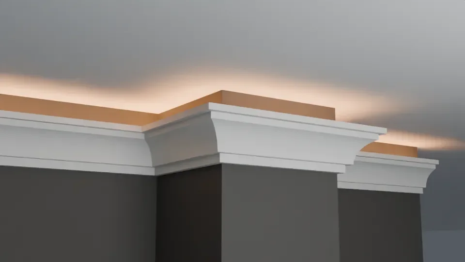 LC-04 white light-cove moulding around an outside corner, with a warm ceiling glow.